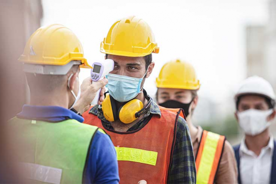 Construction Worker has Temperature Checked