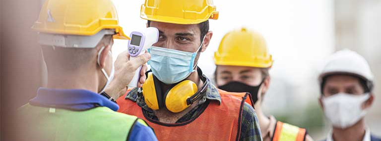 Construction Worker has Temperature Checked